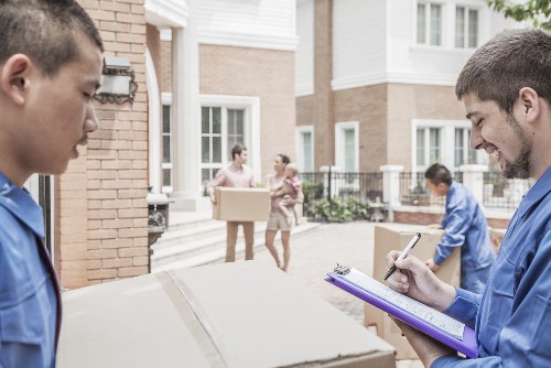 Professional furniture movers at work in Chiswick
