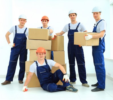 Professional movers assisting with loading