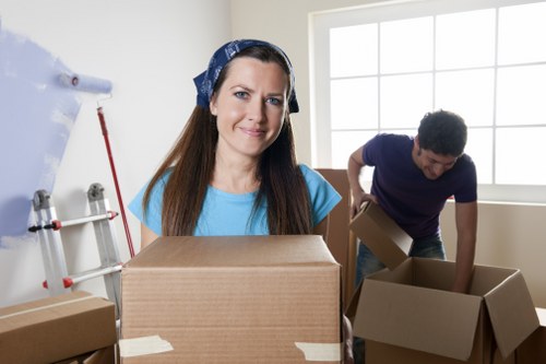 Professional movers loading a van in Chiswick