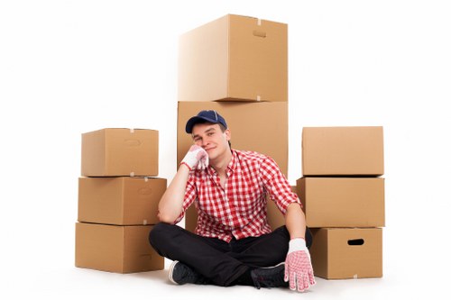 Professional movers handling furniture